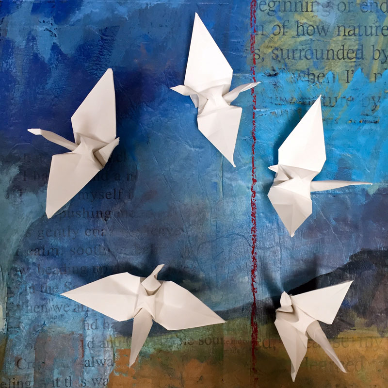 a flock of five origami cranes, crafted by dawn chandler