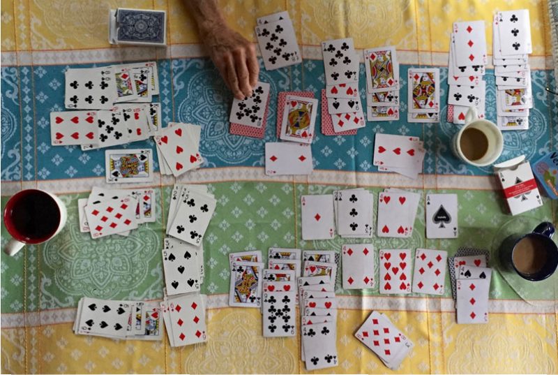 Card games at my aunt's kitchen table at her lake house near Wolfboro, New Hampshire; photo by Dawn Chandler, Santa Fe artist