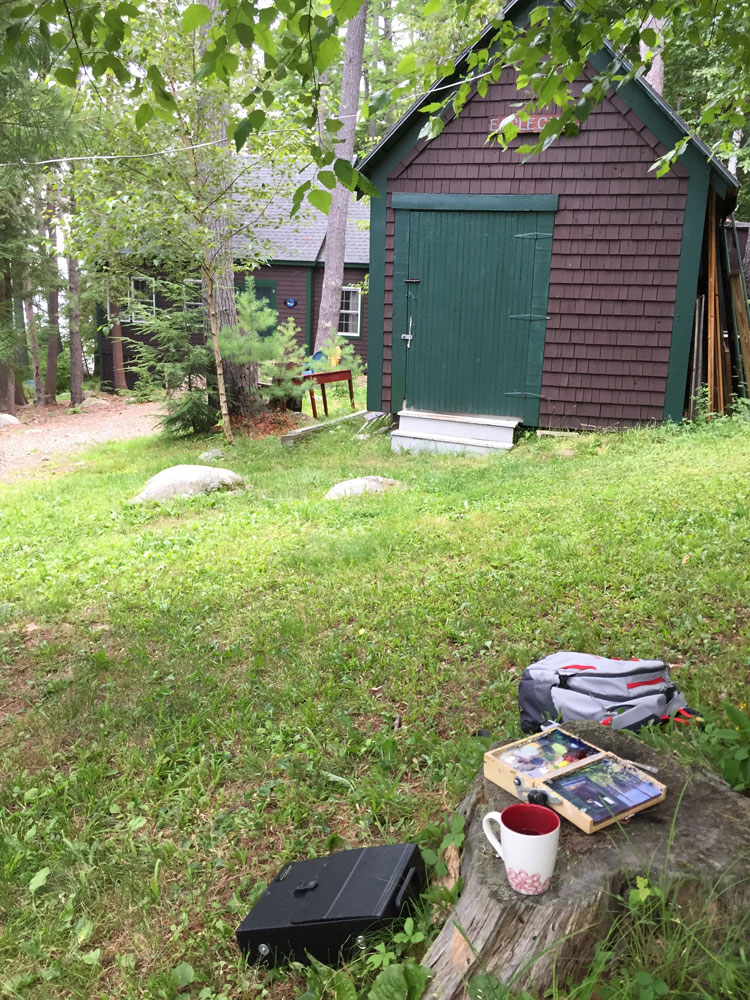 Artist Dawn Chandler's plein airt paint kit sits in front of her aunt's tool shed, now closed up in anticipation of rain, Lake Wentworth. 