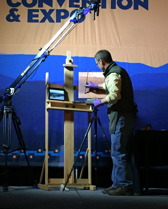 artist john macdonald gives a painting demo at the plein air painting convention and expo, better known as PACE18