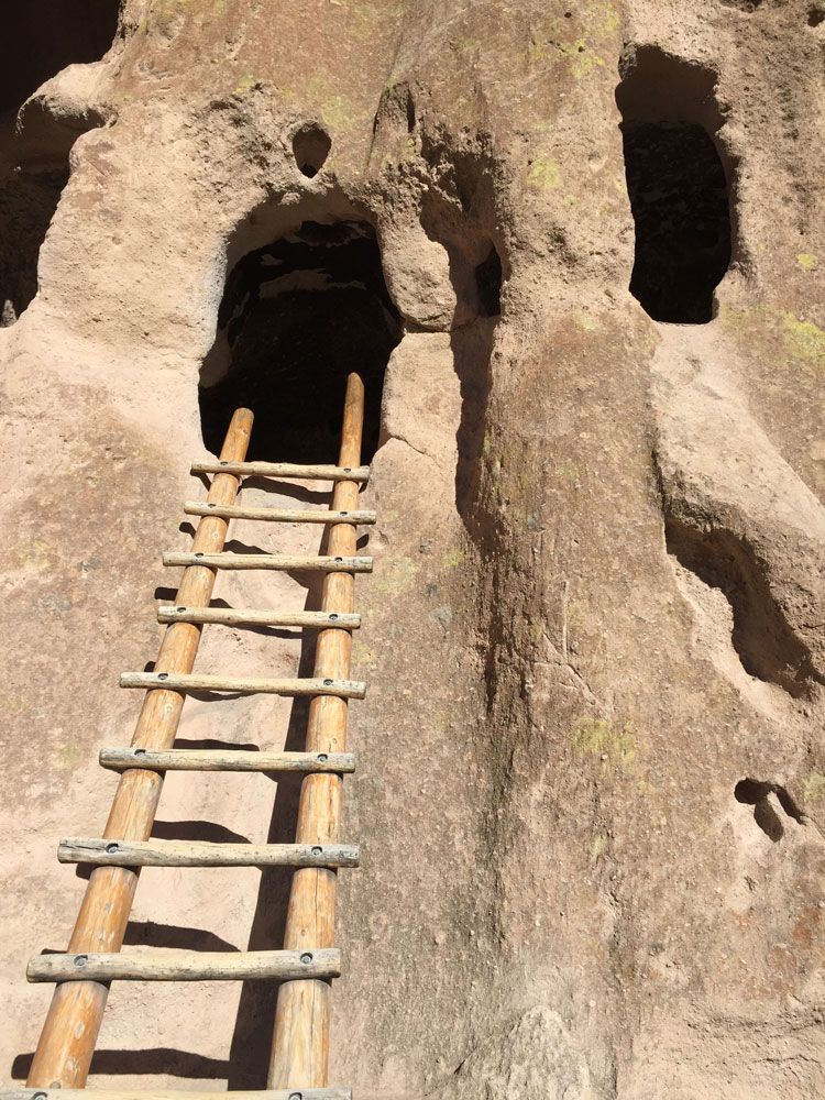 A ladder leading to an ancient dwelling at Bandelier National Monument as photographed by artist Dawn Chandler