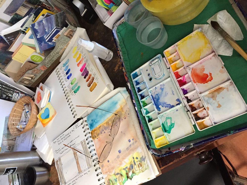 artist Dawn Chandler's watercolor palette and sketchbook