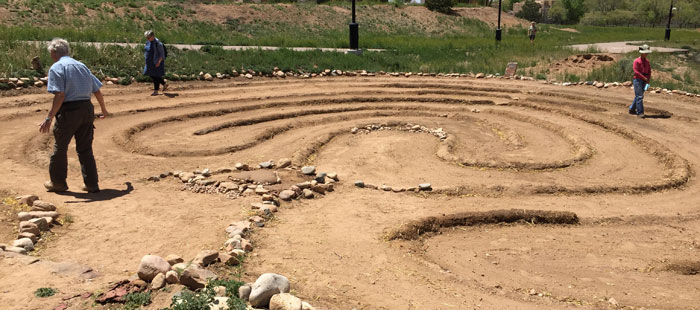 Neighbors gather to walk the Frenchy's Park labyrinth in Santa Fe. Photo by Dawn Chandler.