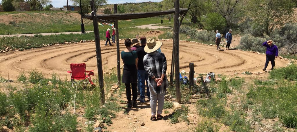 Neighbors gatherto walk the Frenchy's Park labyrinth in Santa Fe. Photo by Dawn Chandler.