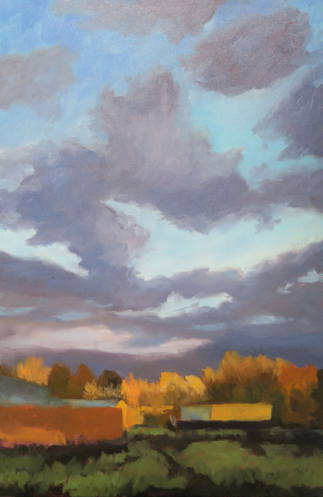 Dawn Chandler adding more touches to her New Mexico landscape oil painting 'Santa Fe September.'