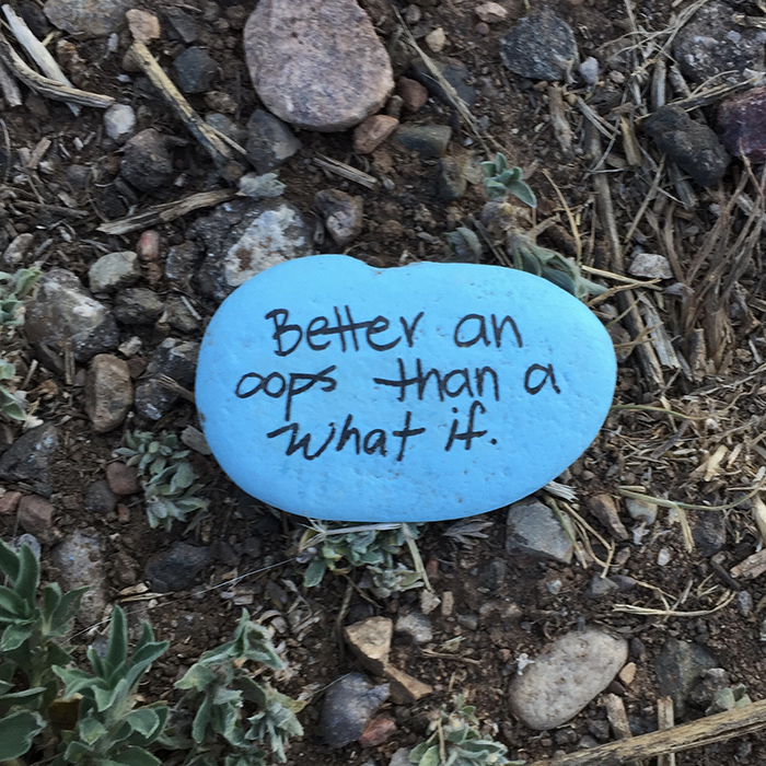 Better and oops than a what if. Blue stone quotation art east side of the Sandias. Photo by Dawn Chandler.