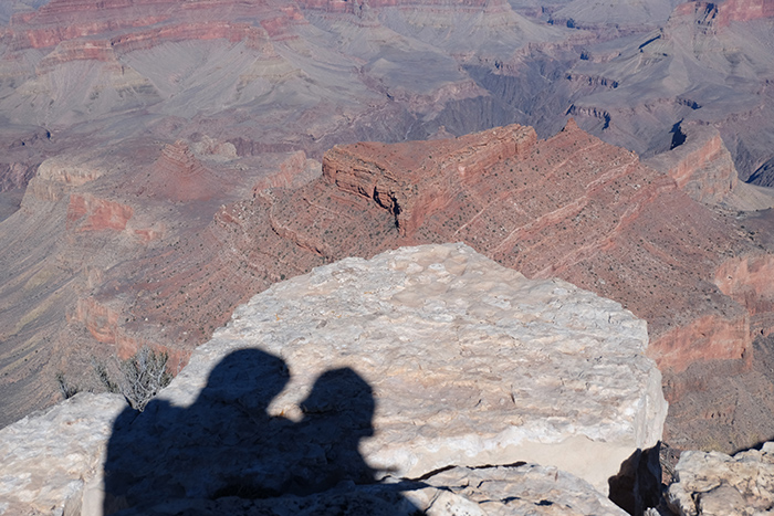 Lovebirds silhouetted at the Grand Canyon.