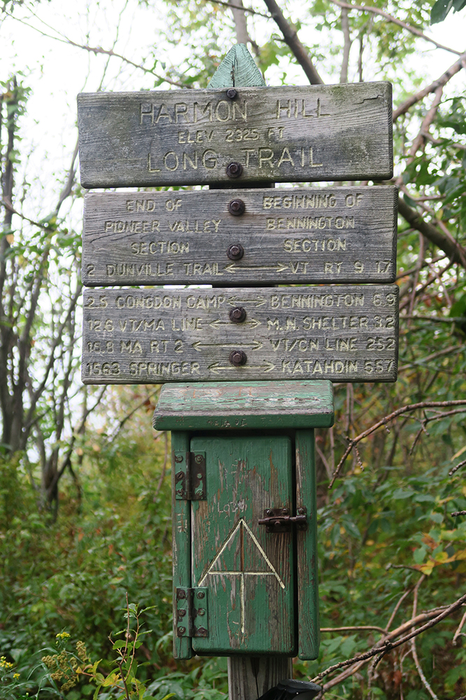 AT and LT signs along the trail on Harmon Hill. Photo by Dawn Chandler.