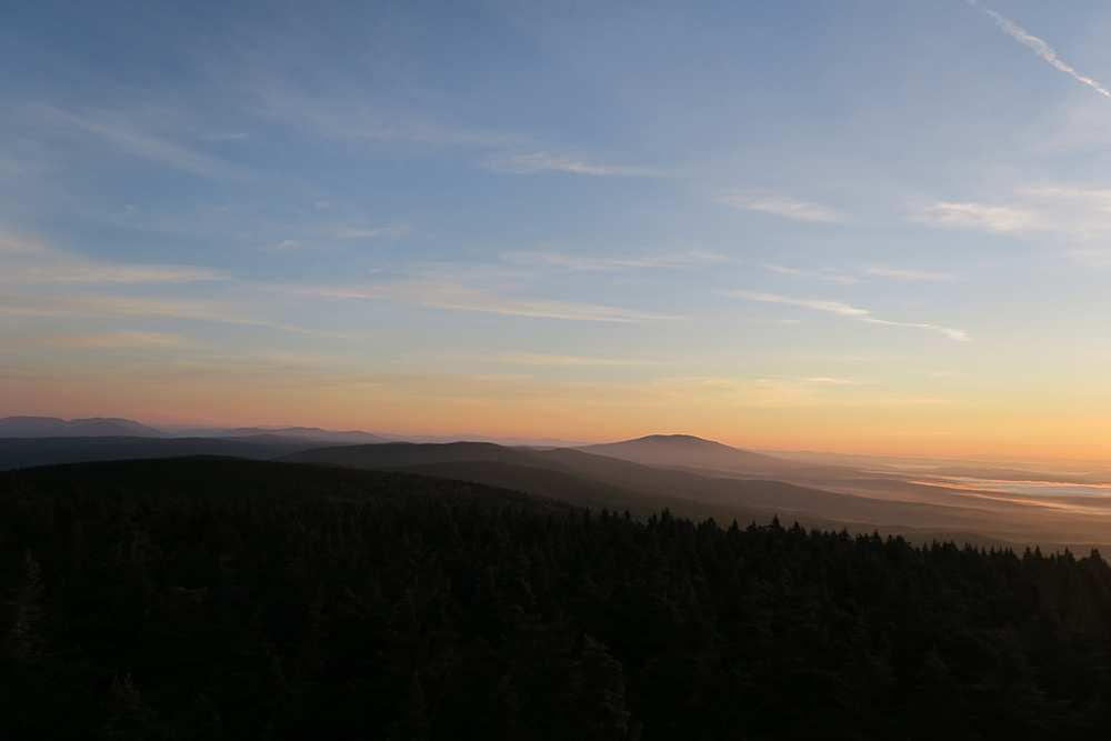 Sunrise light across southern Vermont on the Long Trail. Photo by artist and thru-hiker Dawn TaosDawn Chandler.