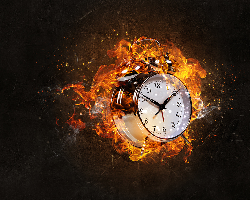 Clock on fire image by Sergy Nivens.