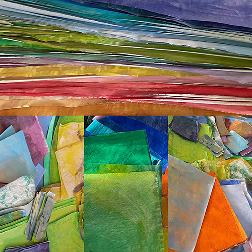 Stacks and piles of hand-painted papers in Dawn Chandler's studio.