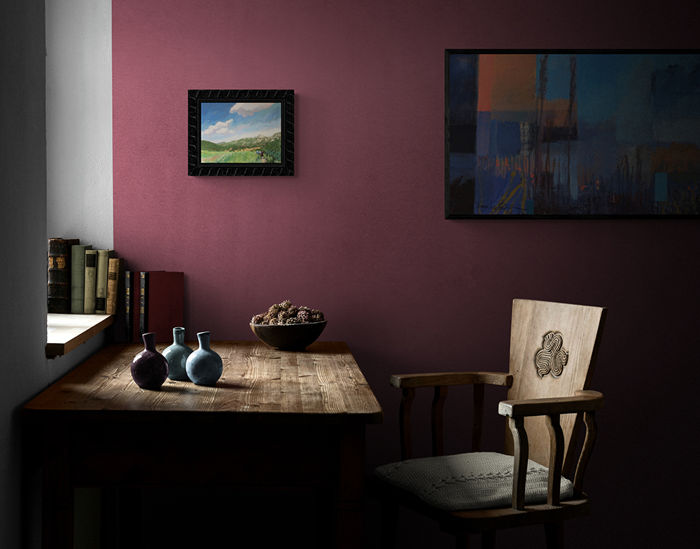 Room mock-up with Dawn Chandler's Philmont painting We All Made It framed on the wall.