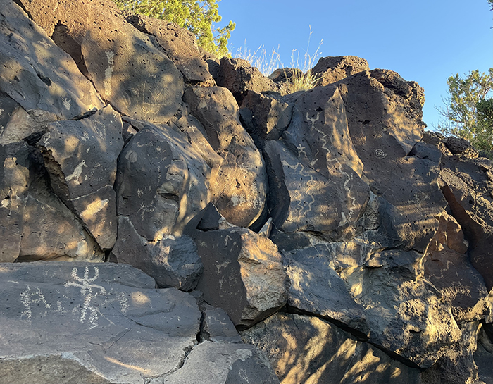 Yet more petroglyphs dappled in shade and sunlight at Cieneguilla in the Caja del Rio, New Mexico. Photo by artist Dawn Chandler.