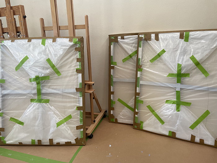 the very large triptych - artist Dawn Chandler's huge triptych landscape painting wrapped up for transport to their new owners' home in Las Campanas, Santa Fe, New Mexico.