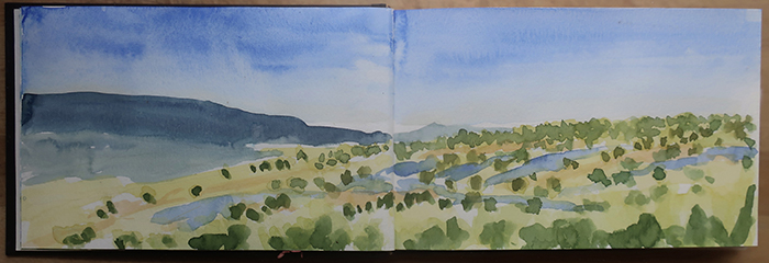 Preparing for the very large triptych project, painting watercolor sketches of big sky at the Caja del Rio, Santa Fe, New Mexico. Watercolor by Dawn Chandler.