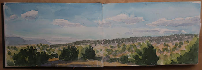 Preparing for the very large triptych project, painting watercolor sketches of big sky at the Caja del Rio, Santa Fe, New Mexico. Watercolor by Dawn Chandler.