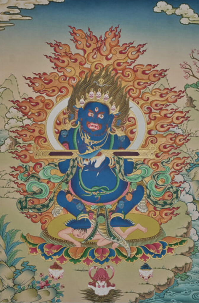 A vivid Tibetan thangka painting of Mara, the wrathful blue demon from Buddhist tradition. Mara appears fierce, with wild hair, multiple crowned heads, and bulging eyes, surrounded by swirling flames. He sits atop a lotus, trampling two anguished figures below, symbolizing the obstacles he creates on the spiritual path. The scene is rendered in bright colors, with dramatic clouds and landscape details.