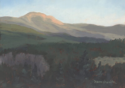 ‘And So the Day Begins’ New Mexico landscape painting by Santa Fe artist Dawn Chandler featuring Philmont’s Baldy Mountain near Ute Park, with soft sunrise light on the summit, layered blue-green ridges and shadowed foreground trees under a pale morning sky.