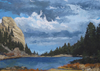 ‘Cathedral Rock – Autumn Clouds’ original New Mexico landscape painting in oil by Santa Fe artist Dawn Chandler, depicting Philmont’s iconic Cathedral Rock beside Cimarroncito Reservoir beneath dramatic blue-and-white autumn clouds.
